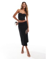 stretch satin bandeau corset top with rose trim in black